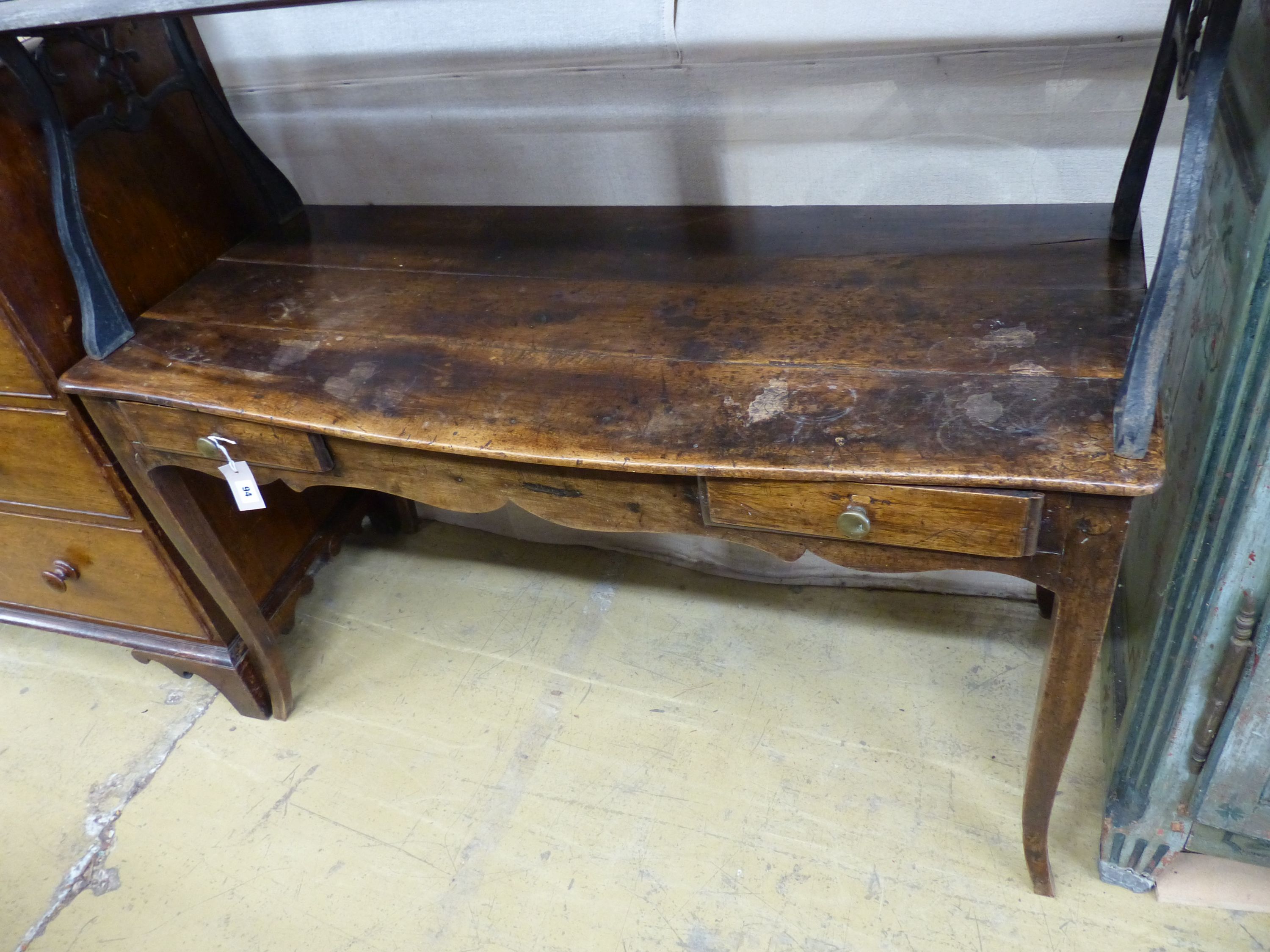 An 18th / 19th century French fruitwood two drawer side table, width 126cm, depth 56cm, height 70cm